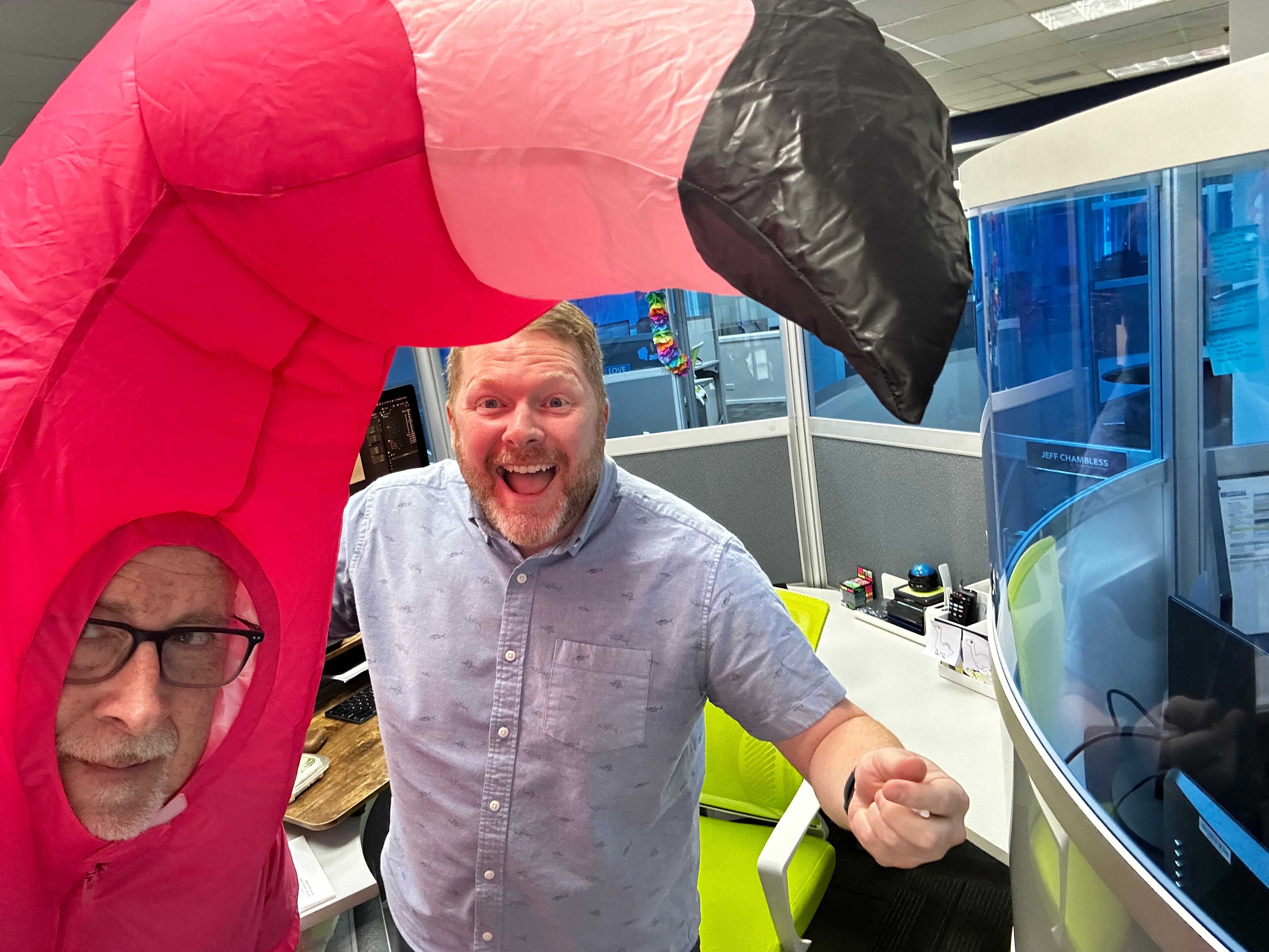 Creative Services Manager Jeff Chambless and FRC Brian Sganga celebrate Fight the Fall at headquarters.