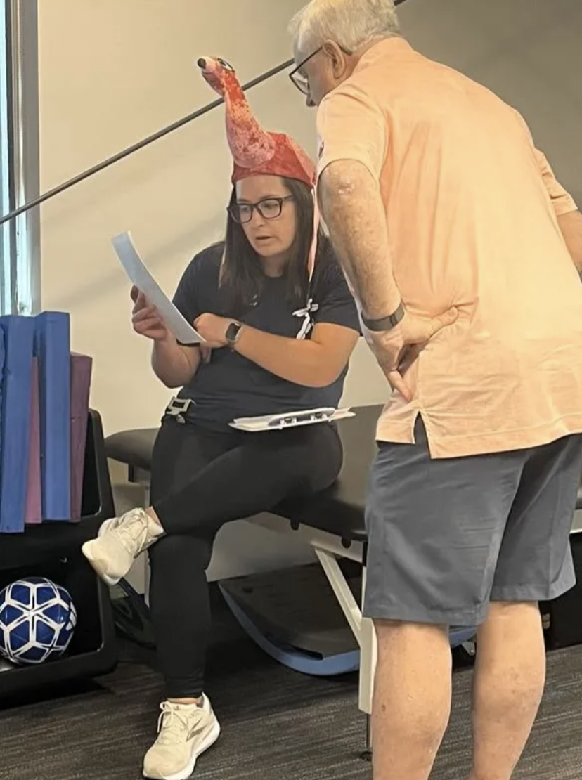 FYZICAL's Laura Lorenzi, PT, DPT, works with a patient during Fight the Fall.