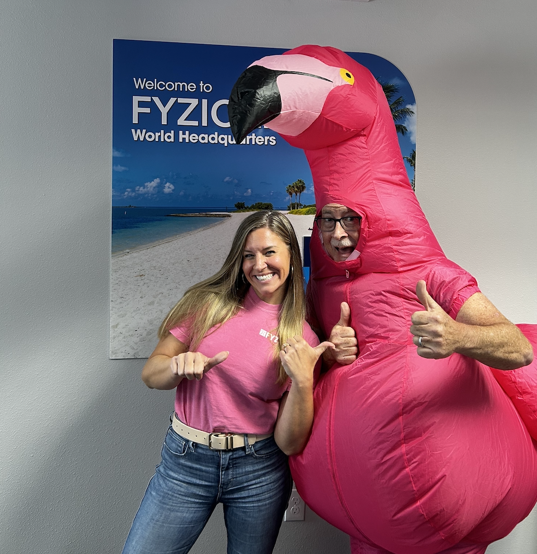Cindy Savage, FYZICAL's Vice President of Marketing & Brand, celebrates Fight the Fall at FYZICAL's headquarters.